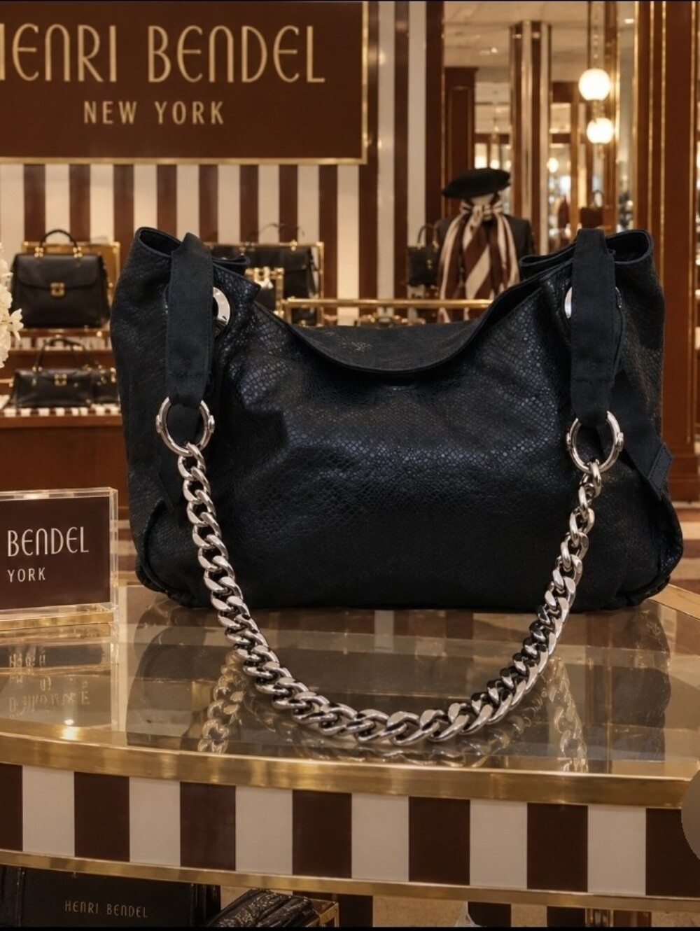 Henri Bendel black with gunmetal snake embossed slouchy shoulder bag